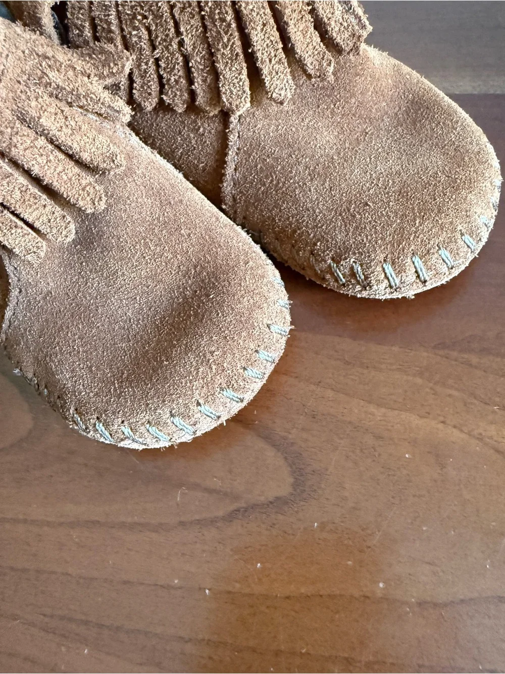 Minnetonka Kids Suede Fringe Moccasins in Brown